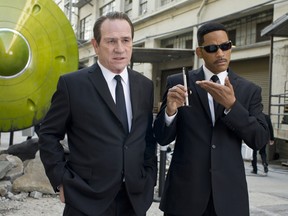 One reader says Tommy Lee Jones (left), who stars with Will Smith in "Men in Black 3," would be ruined if he had plastic surgery to smooth out his wrinkles. (SUBMITTED PHOTO)