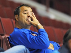 Canucks coach Alain Vigneault watches during Vancouver Canucks NHL hockey training camp at Rogers Arena in Vancouver on Sept. 19, 2011. (Arlen Redekop/PNG FILES)