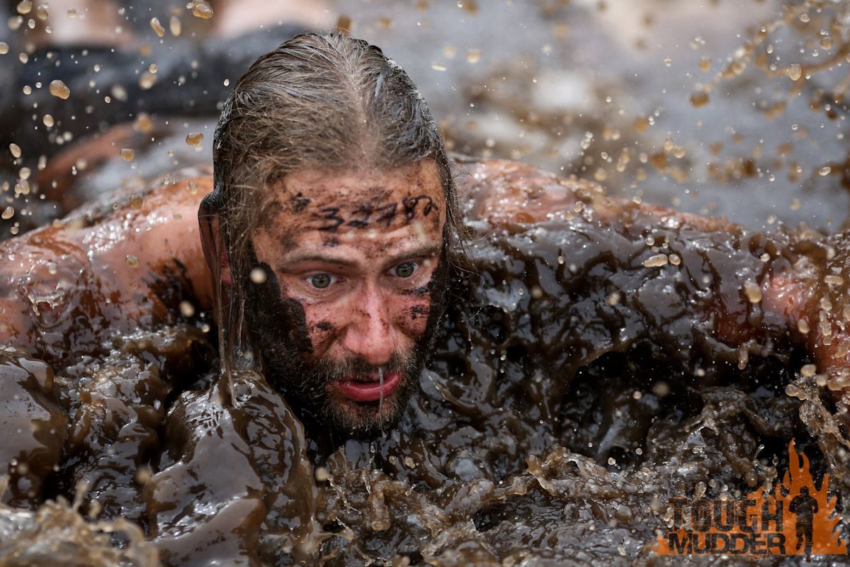 A man swims through a pool of mud during Sunday’s Tough Mudder event in Whistler, B.C. (FROM FACEBOOK)