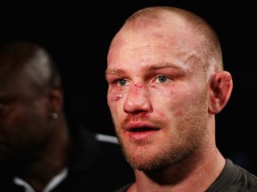 Martin Kampmann earned his third straight win Friday night, earning a second-round stoppage victory over Jake Ellenberger in the main event of the Ultimate Fighter 15 Finale on FX. ((Photo by Mark Kolbe/Getty Images))