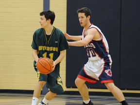 Windsor Dukes' Matt Ros (left) in action against the Sutherland Sabres. (Blair Shier, Handsworth athletics)