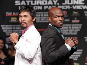 June 6, 2012, Las Vegas, Nevada --- (L-R) Superstar Manny Pacquiao and undefeated Jr. Welterweight champion Timothy "The Desert Storm" Bradley Jr. pose during the the final press conference for their upcoming World Welterweight title mega-fight. Promoted by Top Rank, in association with MP Promotions, Tecate, AT&T and MGM Grand, Pacquiao vs Bradley will take place, Saturday, June 9 at the MGM Grand in Las Vegas, live on HBO Pay Per View. --- Photo Credit : Chris Farina  - Top Rank (no other credit allowed) copyright 2012