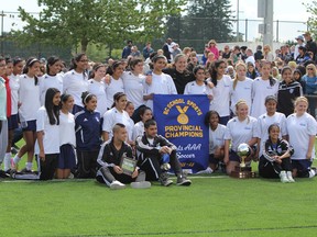 Panorama Ridge Thunder players pose with their historic banner Saturday after a win over Mt. Boucherie of Kelowna in the Triple A final. (Panorama Ridge athletics -- photo)