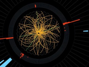 This image provide by CERN shows a proton-proton collision in which four high-energy electrons (green lines and red towers) are observed in a 2011 event. The event, they say, shows characteristics expected from the decay of a Higgs boson. (AP Photo/CERN)