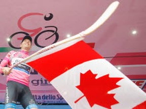 Ryder Hesjedal doesn't just win bike races and wave the flag ... he donates funds to help Canadian athletes like Olympic teammate Denise  Ramsden.