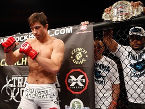 LAS VEGAS - JANUARY 07:  Luke Rockhold (white shorts) is introduced before his fight with Keith Jardine during the Strikeforce event at the Hard Rock Hotel and Casino on January 7, 2012 in Las Vegas, Nevada.  (Photo by Esther Lin/Forza LLC/Forza LLC via Getty Images)