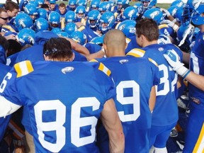 The UBC Thunderbirds are huddled and ready to face Manitoba on Saturday. UBC opened at No. 7 in the first CIS football rankings of the new season. (Bob Frid, UBC athletics)