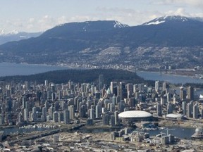 Vancouver is clearly beautiful, with lots going for it, but its high costs have many people questioning The Economist’s decision to call it highly ‘livable.’ (CP FILES)