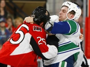 The late Rick Rypien of the Vancouver Canucks would take on all comers, no matter how big, like Chris Neil of the Ottawa Senators.