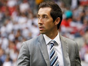 VANCOUVER, CANADA - JULY 18: Head coach Martin Rennie of the Vancouver Whitecaps FC walks to the bench during their MLS game against the Los Angeles Galaxy July 18, 2012 at BC Place in Vancouver, British Columbia, Canada. (Photo by Jeff Vinnick/Getty Images)
