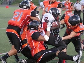 Eric Teng and Jordan Chin of the New Westminster Hyacks swarmed the visiting Abbotsford Panthers on Friday at Mercer Stadium. (Alan Wardle photo)