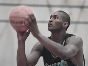 Ron Artest sporting his Van City gear in late May of 1999 as he completed a pre-draft workout in Richmond for the Vancouver Grizzlies. (PNG file photo)