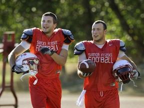 SFU's Adam Berger (left) and Kyle Miller are high school teammates making big hits on defence for the NCAA Clan. (Mark van Manen, PNG photo)