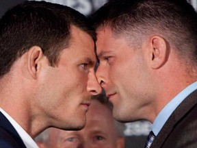 The heated battle between Michael Bisping (L) and Brian Stann only marks the midway point of Saturday's pay-per-view event.