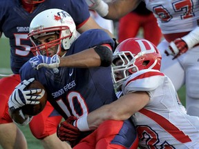 SFU running back Bo Palmer was a handful for Dixie State on Saturday, rushing for four touchdowns in a Clan win. (Les Bazso, PNG)