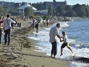 Here, amazingly without any help from city politicians, several people manage to enjoy themselves on Sept. 16 at English Bay. Stuart Davis — PNG