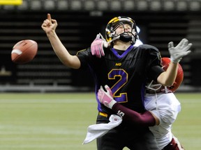 W.J. Mouat's Sheriden Lawley sacks Mt. Douglas quarterback Jordan Deverill during Subway Bowl 2011. The two teams will meet again, Oct. 13 at Mouat in Triple A's game of the year. (PNG photo)