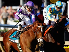 Mario Gutierrez, who grew up as a jockey at Hastings Racecourse in Vancouver, rode I'll Have Another to victory at the Preakness Stakes in Baltimore in May 2012. He edged out Mike Smith, aboard Bodemeister (right). Getty Images file.