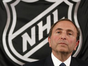 NHL commissioner Gary Bettman listens as he meets with reporters after a meeting with team owners on Thursday, Sept. 13 in New York. The current collective bargaining agreement between the league and the players expires Saturday at midnight. (AP)