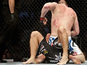 Stefan Struve dropping bombs on Sean "Big Sexy" McCorkle at UFC 124 in Montreal. (Photo credit ROGERIO BARBOSA/AFP/Getty Images)
