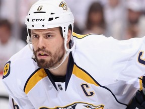 When Shea Weber signed an offer sheet with Philadelphia in July and it was matched by Nashville, the restricted free agent process was part of the expired CBA. But comments by Detroit senior vice-president Jimmy Devellano about that offer sheet caught Vancouver Canucks goaltender Cory Schneider by surprise. (Getty Images via National Hockey League).