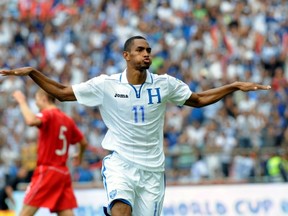 Honduran Jerry Bengtson scores in an 8-1 win over Canada in FIFA World Cup qualifying on Tuesday. (ORLANDO SIERRA/AFP/Getty Images)