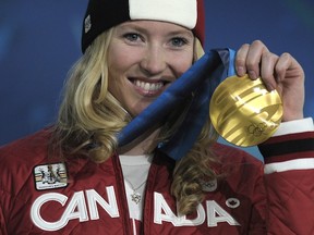 Whistler's Ashleigh McIvor: she likes gold medals, and Jay DeMerit's mullet. (DAVID HECKER/AFP/Getty Images)