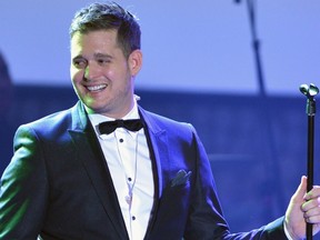 Michael Buble is an ardent Vancouver Canucks fan and supporter of a dozen charities. It would be the ultimate coup if Kevin Bieksa can convince the Burnaby crooner to play in an Oct. 17 charity game at UBC. (Getty Images).