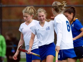 HANNAH AND HER (FIELD HOCKEY) SISTERS... UBC's Hannah Haughn (centre) tallied twice Sunday in UBC's regular-season ending 6-0 win over Victoria at Wright Field. (Richard Lam, UBC athletics)
