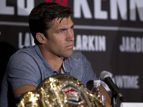 Already missing an opponent for Daniel Cormier, next month's Strikeforce card was dealt a crippling blow as middleweight champion Luke Rockhold (pictured) has been forced out of his bout with Lorenz Larkin.