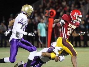 WJ Mouat's Maleek Irons (right) gets set to face visiting Mt. Douglas on Saturday. (Jean Konda-Witte, Abbotsford Times)