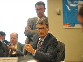 Vancouver Mayor Gregor Robertson listens during Mayors Council on Transportation meeting where mayors rejected new taxes for TransLink. (Arlen Redekop/PNG FILES)