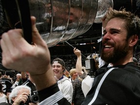 Willie Mitchell got a thrill when he hoisted the Stanley Cup in June and a jolt after raising a glass of wine Saturday when tsunami sirens sounded in Tofino. (Getty Images via National Hockey League).