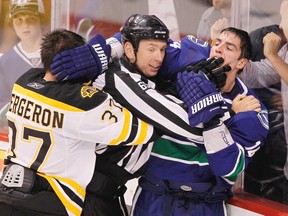 In the NHL/NHLPA dispute, someone's putting their finger in someone else's mouth. Who'd you rather be, Bergeron or Burrows?