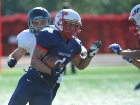 SFU's Bobby Pospischil was one of three Clan receivers lifting the local NCAA team's passing attack into high gear. (Arlen Redekop, PNG)