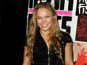LOS ANGELES, CA - OCTOBER 25: MMA fighter Ronda Rousey arrives at a special screening of Universal Pictures' 'The Man With The Iron Fists' at the Chinese 6 Theatres on October 25, 2012 in Los Angeles, California. (Photo by Kevin Winter/Getty Images)