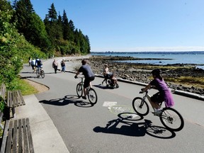 Most people who use the seawall around Stanley Park have noticed an increase in tension between pedestrians, cyclists and other users, something the city hopes to fix with a new plan. (Arlen Redekop / PNG FILES)

(For story by [Paul Luke])
