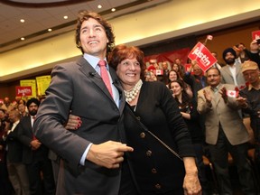 About 800 people attended a meet-and-greet at a Richmond hotel Wednesday with Liberal MP Justin Trudeau, who is seeking his party’s leadership. He's seen here hugging his mother Margaret. (CP)