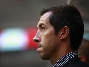 Martin Rennie is using every trick in the book to get the Whitecaps in the right frame of mind for their first MLS playoff game. (Jeff Vinnick/Getty Images)