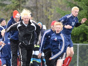 Members of Kamloops' Sa-Hali Sabres go for a pre-match warm-up run around the fields at Burnaby Lakes on Monday. The Sabres face Maple Ridge's Samuel Robertson Titans at 9 am Wednesday in its final game.