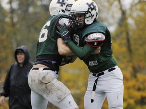 Lord Tweedsmuir's Dylan Battye (riight) pushes off on his prosthetic left leg during team practice. (Gerry Kahrmann, PNG)