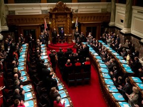 Lt.-Gov. Judith Guichon, centre, receives a standing ovation from MLAs at the  Legislature after being sworn in as the 29th lieutenant-governor of the province on Friday, Nov. 2. Some readers have become pretty cynical about how politicians of all stripes line their own pockets. (CANADIAN PRESS FILES)