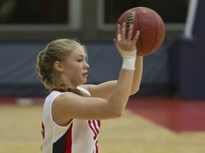 SFU's Kristina Collins didn't let a heavily-taped right shooting hand impede her in the Clan's decisive win Thursday in the West Gym. (Ron Hole, SFU athletics)