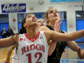 Maple Ridge's Kolbie Orum (front) looks to battle for a rebound with Robyn Aulin-Hayes of the Argyle Pipers. (PNG photo)
