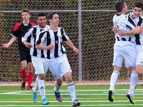 Striker Michael Mobilio celebrates his first-half goal, one which stood as the winner Saturday morning in Dr. Charles Best's 1-0 victory over crosstown rival Terry Fox in the B.C. Triple A boys soccer final at Burnaby Lakes. (Nick Procaylo, PNG photo)