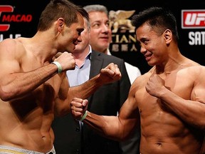 Middleweights Rich Franklin (L) and Cung Le square off in the main event of UFC on FUEL TV 6 this morning from the Cotai Arena in Macao.