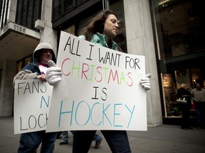 These hockey fans aren't the only ones hoping for a Christmas miracle. (Getty Images)