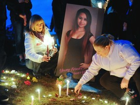 Hundreds attended a vigil for Amanda Todd in Coquitlam’s Town Centre Park Oct. 19, one of many around the world to remember the bullied teen. (Les Bazso/PNG FILES)