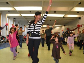 Reeti Soni of the University of B.C.’s Hindi dance team shares some moves at Renfrew Park Community Centre in Vancouver. (Arlen Redekop/PNG FILES)