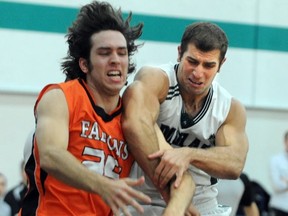 Langara's Jesse Jeffers (left) battles with Douglas College's Devan Haynes during a recent CCAA contest in New Westminster. (PNG photo)